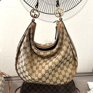 Gucci Signature Hobo with gold G hardware.